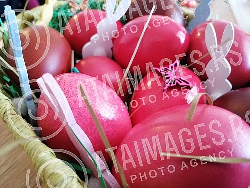 The red color is a symbol of joy and resurrection, and the first red egg is kept until the next Easter as a 