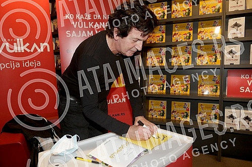 At the Vulkan bookstore in the Usce Shopping Center, Momcilo Bajagic Bajaga signed his book 