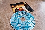 Cover and CD Nevermind, the second studio album of the American music group Nirvana, released on September 24, 1991 by Geffen Records.Omot i CD-a Nevermind, drugog studijskog albuma americke muzicke grupe Nirvana, objavljenog 24. septembra 1991. u