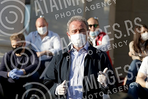  Representatives and leaders of opposition parties that announced the boycott of the election gathered in front of the Serbian Parliament tonight to protest because they believe the state of emergency has violated the Serbian Constitution due to a co