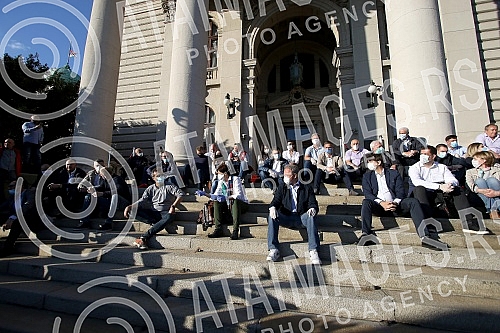  Representatives and leaders of opposition parties that announced the boycott of the election gathered in front of the Serbian Parliament tonight to protest because they believe the state of emergency has violated the Serbian Constitution due to a co