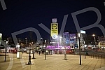 Roundabout on Slavija Square with illuminated fountain at night.

Kruzni tok na Trgu Slavija  sa osvetljenom fontanom nocu.