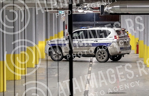 A police vehicle arrives to pick up acting teacher Miroslav Mika Aleksic, who is leaving the Higher public prosecutor's office, where he was questioned and on that occasion denied the accusations that he was a student at his school. Policijsko vozi