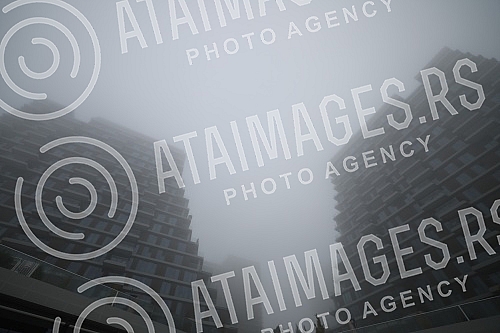 City pollution mixed with morning fog, Belgrade cityscape.Zagadjenje grada pomesano sa jutarnjom maglom, gradski pejzaz Beograda.
