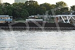The coal on the barge floats on the Sava River in the direction of Obrenovac.Ugalj na barzi plovi rekom Savom u pravcu  Obrenovca.