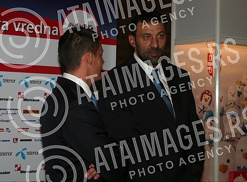 The ceremony at the Hyatt Hotel, at which President of the Olympic Committee of Serbia Vlade Divac signed an official invitation to participate in the London Games. Svecanost u hotelu 