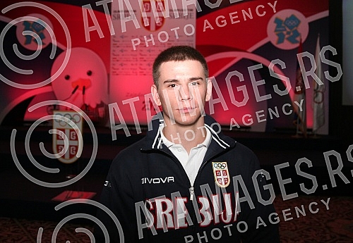 The ceremony at the Hyatt Hotel, at which President of the Olympic Committee of Serbia Vlade Divac signed an official invitation to participate in the London Games. Svecanost u hotelu 