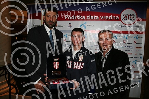 The ceremony at the Hyatt Hotel, at which President of the Olympic Committee of Serbia Vlade Divac signed an official invitation to participate in the London Games. Svecanost u hotelu 