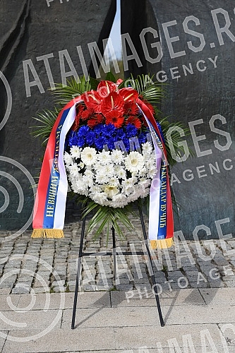 State wreath-laying ceremony and state and military honors to mark Holocaust Remembrance Day, genocide and other victims of World War II fascism at the Monument to the Victims of World War II Genocide within the former Nazi death camp complex, 