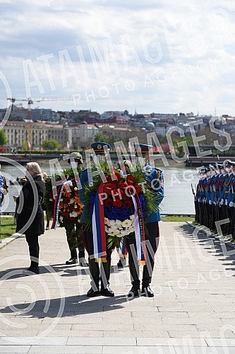State wreath-laying ceremony and state and military honors to mark Holocaust Remembrance Day, genocide and other victims of World War II fascism at the Monument to the Victims of World War II Genocide within the former Nazi death camp complex, 