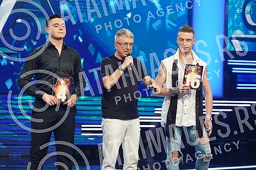 The finals of the 15th season of the Zvezda Granda music competition are being held in the Grand Studio, and 16 candidates are fighting for the award.Finale 15. sezone muzickog takmicenja Zvezde Granda odrzava se u Grand studiju,  a za nagradu se b