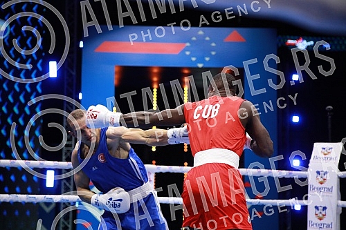 2021 Olympic Boxing World Championships - Stark Arena. Round 32, Men's Middle (75kg), Yoenlis Felician Hernandez Martinez (Cuba) (RED) vs Zharkynbek Turatov (Turkey).Svetsko prvenstvo u olimpijskom boksu 2021 - Stark arena.
