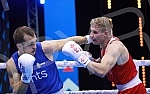 2021 Olympic Boxing World Championships - Stark Arena. Round 32, Light Heavyweight (80kg), Kaan Aykutsun(Turkey) (RED) vs Vladimir Mironchikov (Serbia).Svetsko prvenstvo u olimpijskom boksu 2021 - Stark arena.