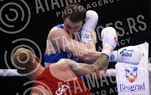 2021 Olympic Boxing World Championships - Stark Arena. Round 32, Light Heavyweight (80kg), Luka Plantic (Croatia) (RED) vs Aliaksei Alfiorau (Belarus). Svetsko prvenstvo u olimpijskom boksu 2021 - Stark arena.