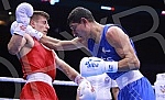 2021 Olympic Boxing World Championships - Stark Arena. Round 32, Light Welterweight (63.5kg), Kerem Oezmen (Turkey) (RED) vs Pavel Fedorov (Serbia).Svetsko prvenstvo u olimpijskom boksu 2021 - Stark arena.