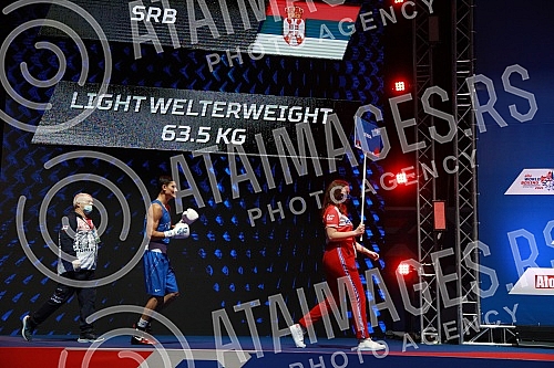 2021 Olympic Boxing World Championships - Stark Arena. Round 32, Light Welterweight (63.5kg), Kerem Oezmen (Turkey) (RED) vs Pavel Fedorov (Serbia).Svetsko prvenstvo u olimpijskom boksu 2021 - Stark arena.