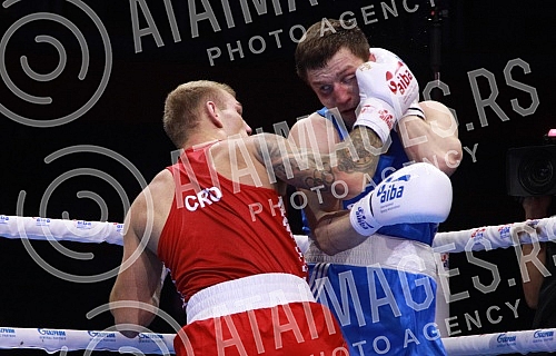 2021 Olympic Boxing World Championships - Stark Arena. Round 32, Light Heavyweight (80kg), Luka Plantic (Croatia) (RED) vs Aliaksei Alfiorau (Belarus). Svetsko prvenstvo u olimpijskom boksu 2021 - Stark arena.