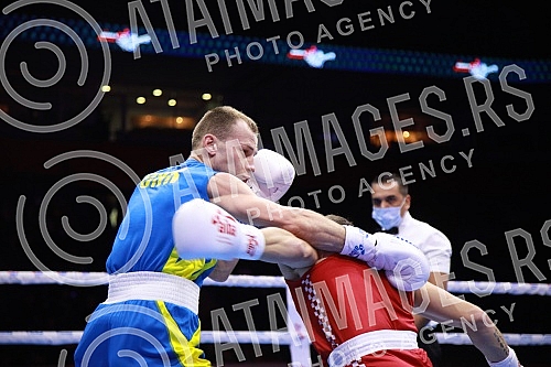 2021 Olympic Boxing World Championships - Stark Arena. Round 32, Light Welterweight (63.5kg), Mateo Komadina (Croatia) (RED) vs Denys Pesotskyy (Ukraine).Svetsko prvenstvo u olimpijskom boksu 2021 - Stark arena.