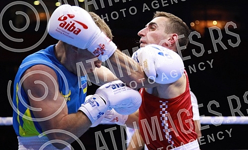 2021 Olympic Boxing World Championships - Stark Arena. Round 32, Light Welterweight (63.5kg), Mateo Komadina (Croatia) (RED) vs Denys Pesotskyy (Ukraine).Svetsko prvenstvo u olimpijskom boksu 2021 - Stark arena.