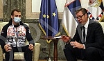The President of the Republic of Serbia, Aleksandar Vucic, met with the winner of the bronze medal at the World Boxing Championship, Vladimir Mironcikov, and the delegation of the Boxing Association of Serbia. Predsednik Republike Srbije Aleksandar