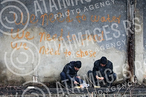Abandoned hangar behind the bus and train station where the migrants from war-torn countries (Middle East) have found refuge on the road to European Union countries.Napusteni hangar iza autobuske i zelezniccke stanice na kome su migranti iz ratom za