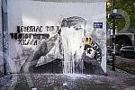 A bucket of lime was thrown on the mural with the image of Ratko Mladic, and behind it stands Djordjo Zujovic, a longtime activist and member of the Social Democratic Party of Serbia.Na mural sa likom Ratka Mladica bacena je kofa kreca, a iza toga 