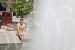 A migrant from Kuwait is bathing in a fountain on Nikola Pasic Square.Migrant iz Kuvajta se kupa u fontani na Trgu Nikole Pasica.