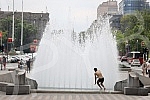 A migrant from Kuwait is bathing in a fountain on Nikola Pasic Square.Migrant iz Kuvajta se kupa u fontani na Trgu Nikole Pasica.