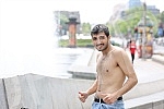 A migrant from Kuwait is bathing in a fountain on Nikola Pasic Square.Migrant iz Kuvajta se kupa u fontani na Trgu Nikole Pasica.