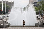 A migrant from Kuwait is bathing in a fountain on Nikola Pasic Square.Migrant iz Kuvajta se kupa u fontani na Trgu Nikole Pasica.