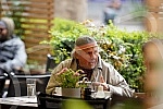Actor Zijah Sokolovic drinks coffee in the garden of the Sumatovac restaurant despite the cold weather.Glumac Zijah Sokolovic uprkos prohladnom vremenu u basti restorana Sumatovac pije kafu.