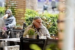 Actor Zijah Sokolovic drinks coffee in the garden of the Sumatovac restaurant despite the cold weather.Glumac Zijah Sokolovic uprkos prohladnom vremenu u basti restorana Sumatovac pije kafu.